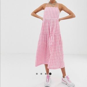 Pink and white gingham midi dress.